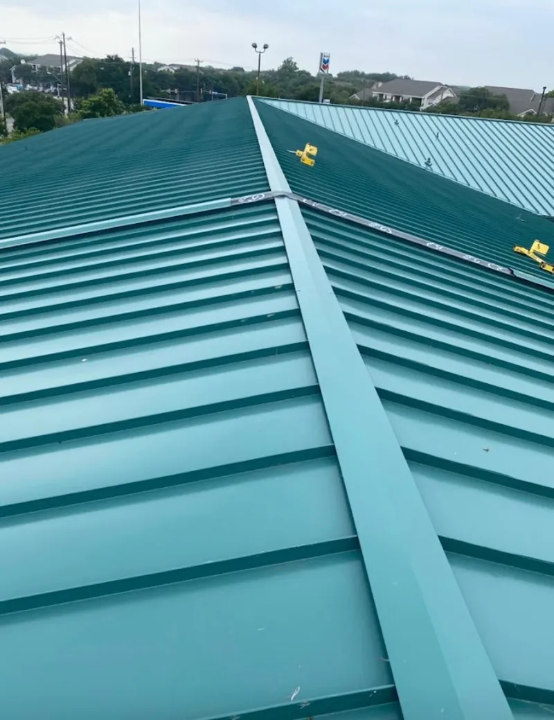 Green commercial metal roof ridge and valley for Metal Roof Repair in League City