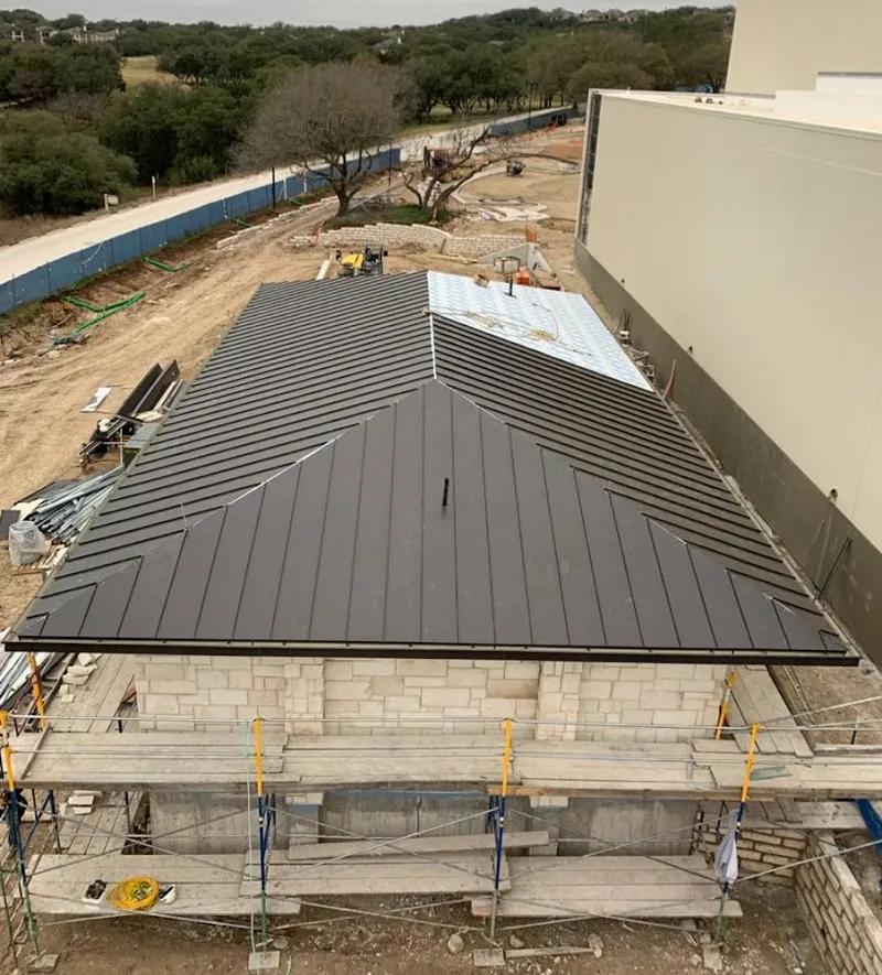 Metal roof new construction with scaffolding in League City