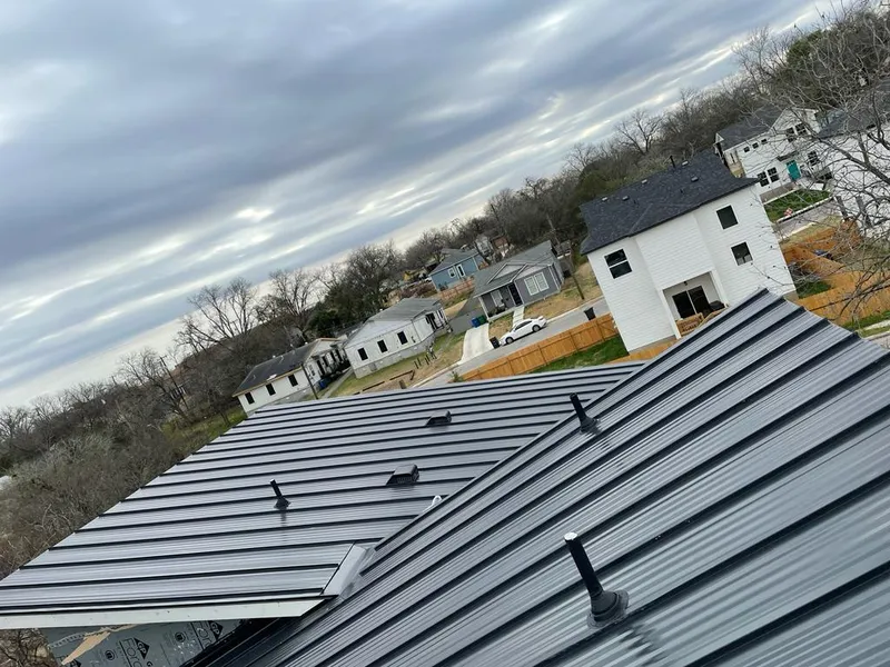 Standing seam metal roof panels with vents for Skylight Repair in League City